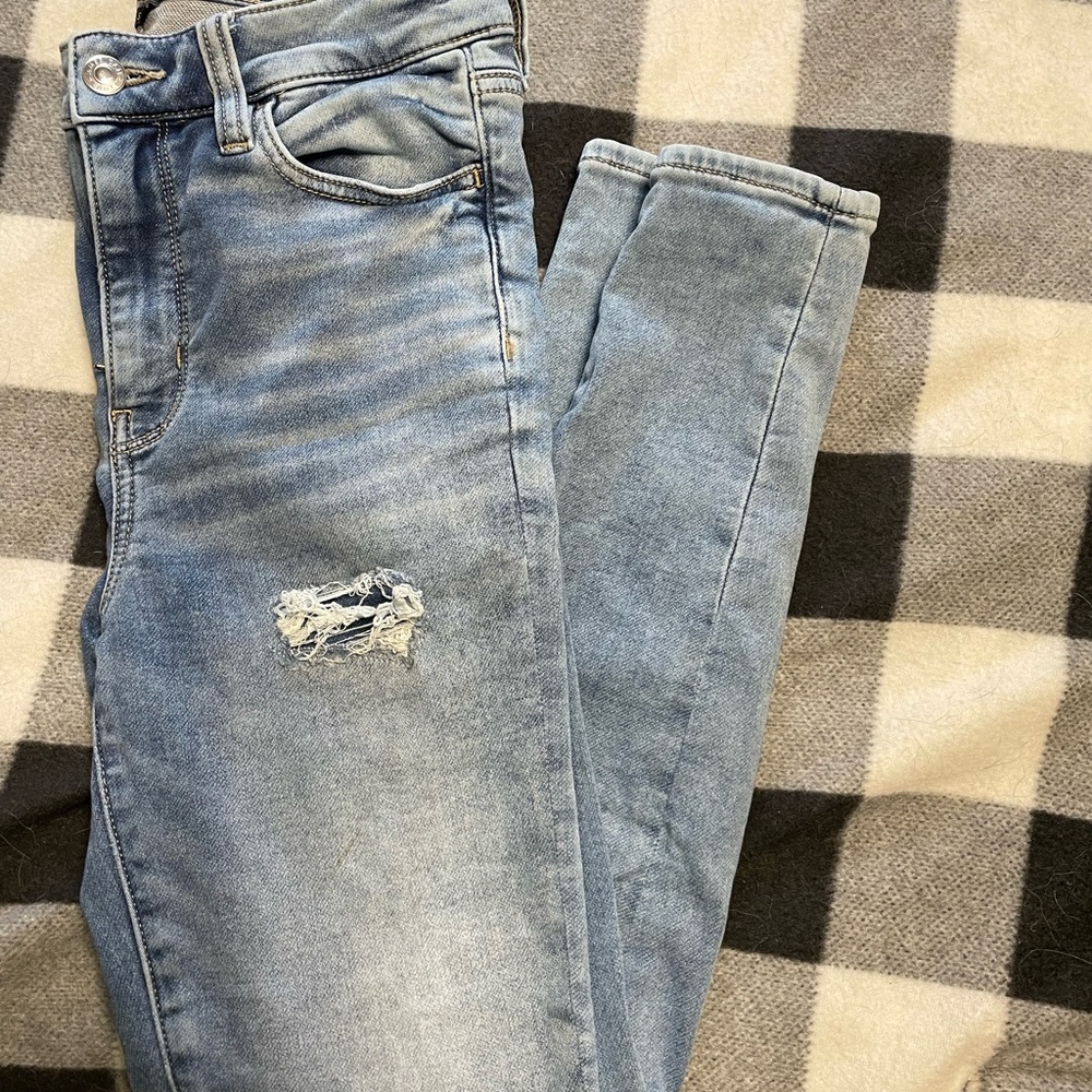 Distressed American Eagle Next Level Stretch Super Hi Rise Jeggings